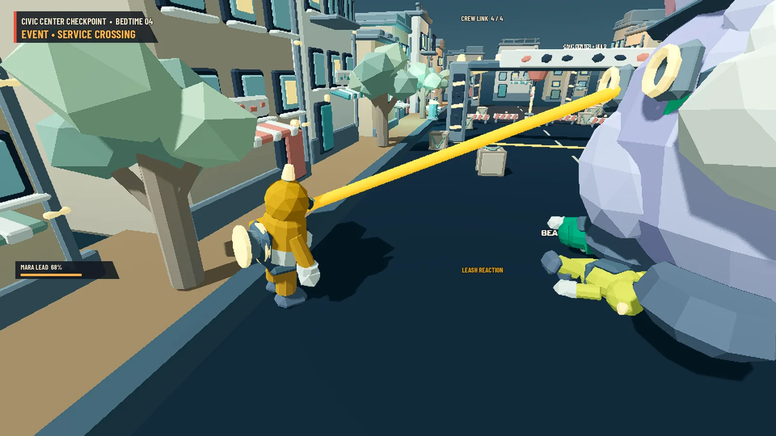 Two handlers lie flattened beside Bean while a yellow lead stays taut.